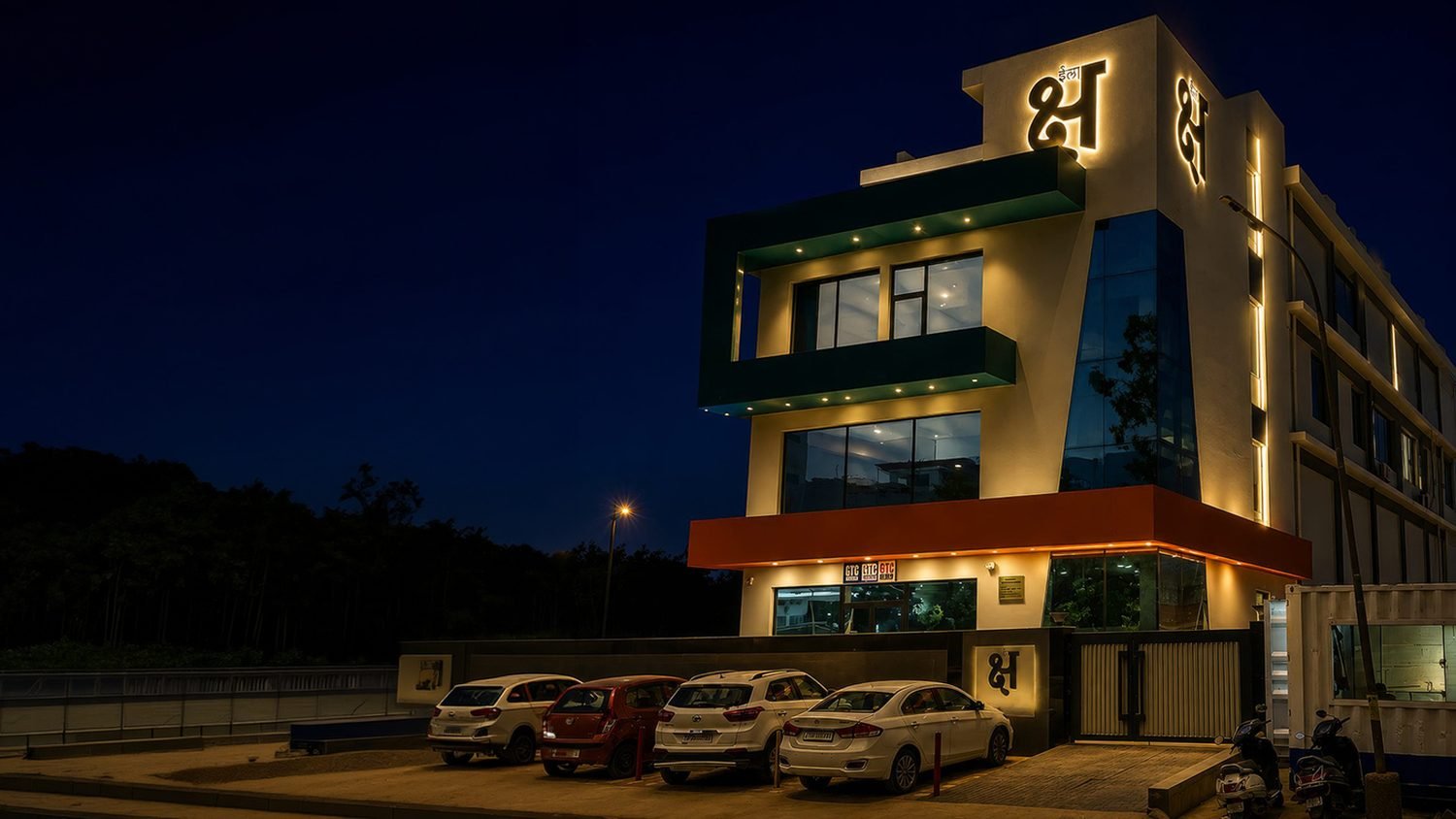 Ilaksha Studios building exterior at night, Mohali
